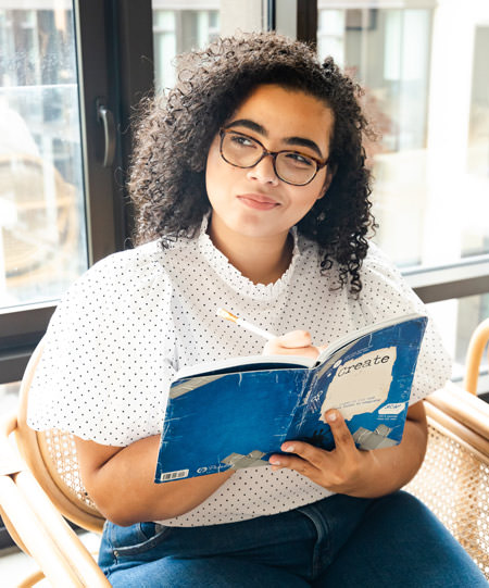 woman writing down thoughts