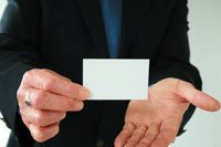 Man holding business card